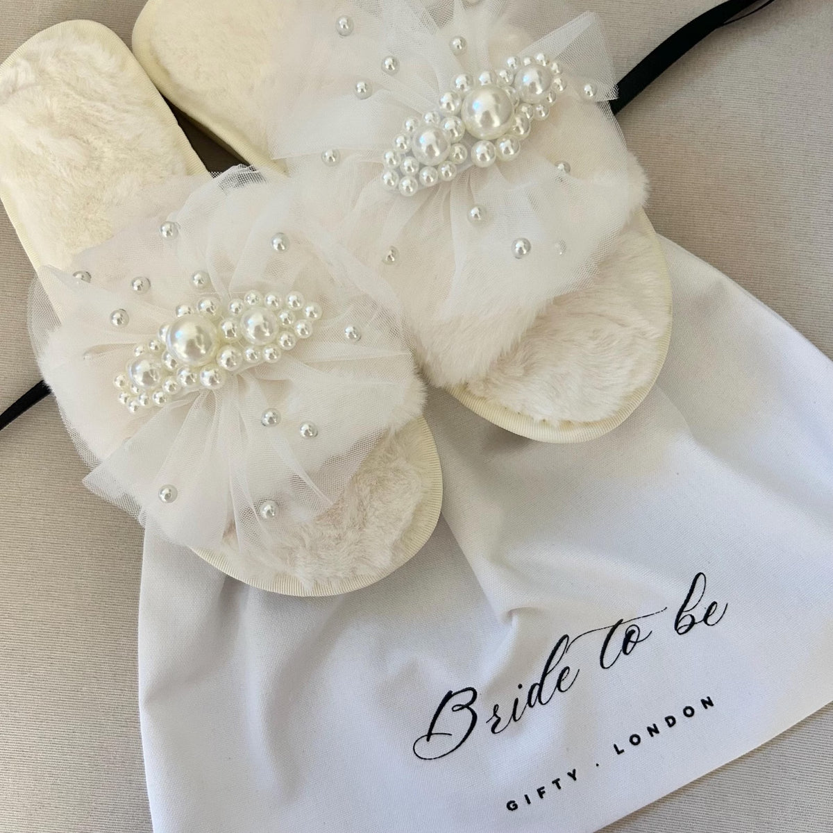 Cream tulle and pearl bridal slippers with Bride To Be dust bag
