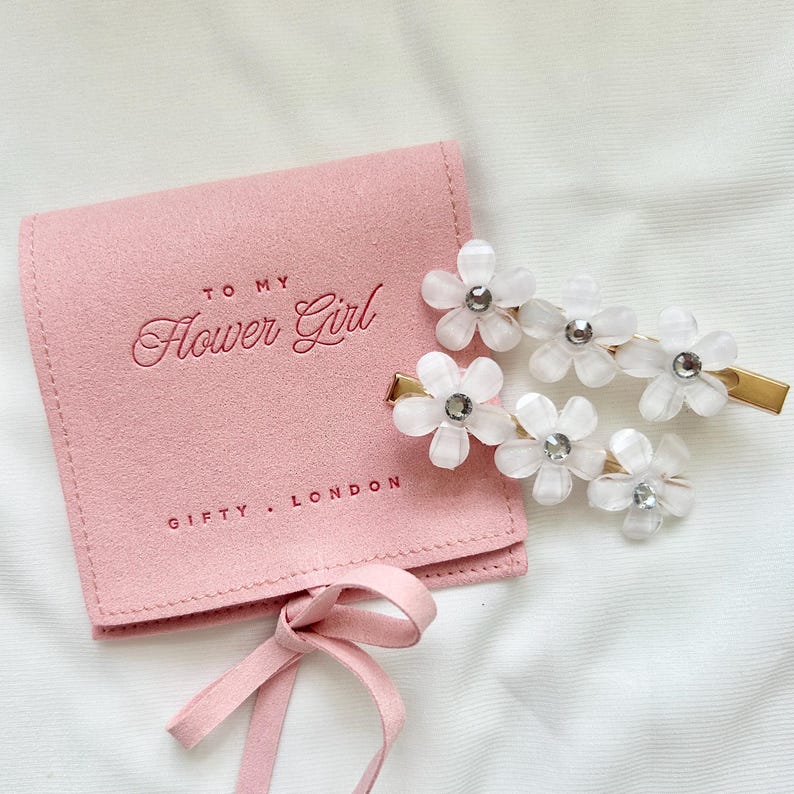 Flower girl hair slides close up