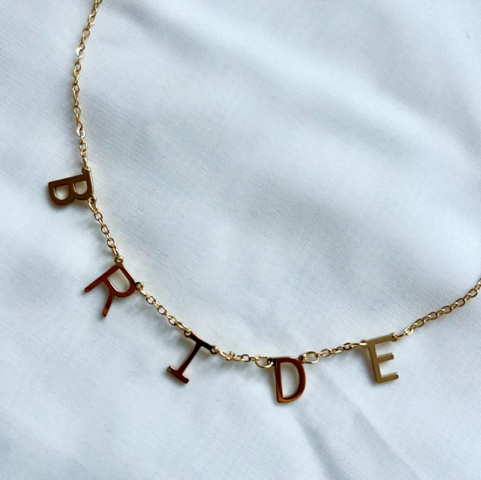 Gold BRIDE necklace close-up