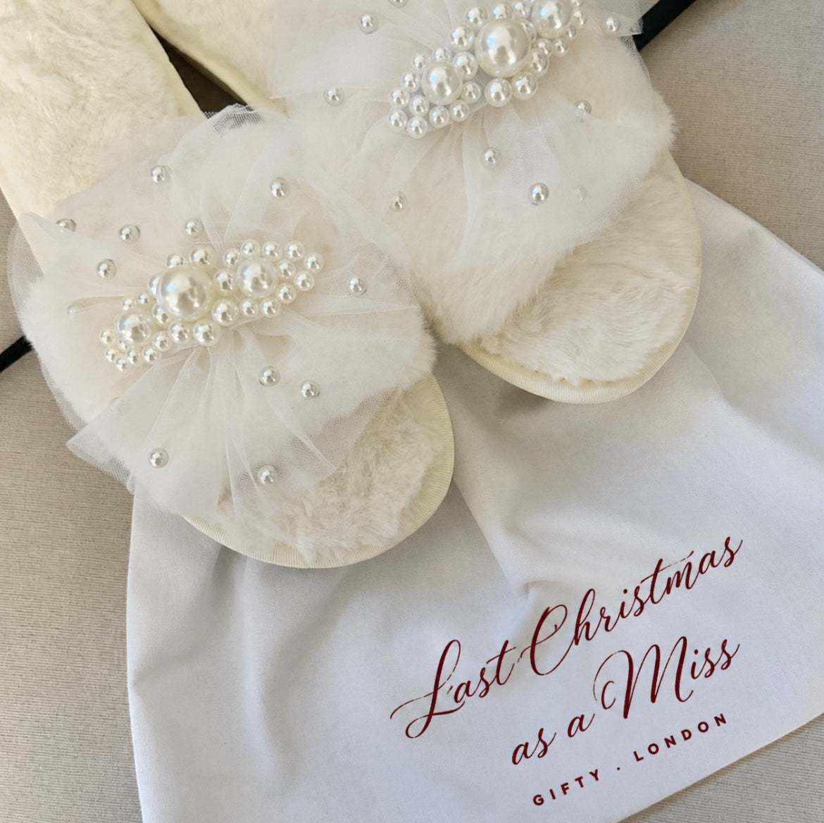 Last Christmas as a Miss pearl and tulle bridal slippers with gift bag
