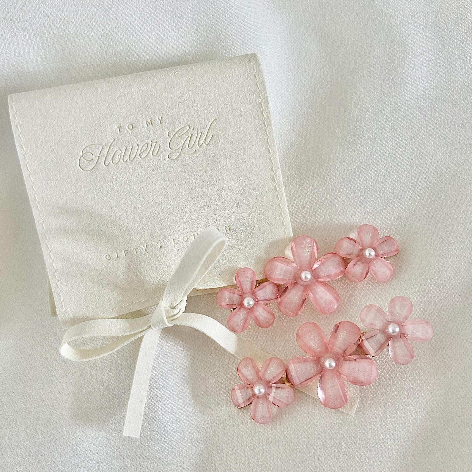 Pair of pink flower hair clips with Flower Girl keepsake pouch