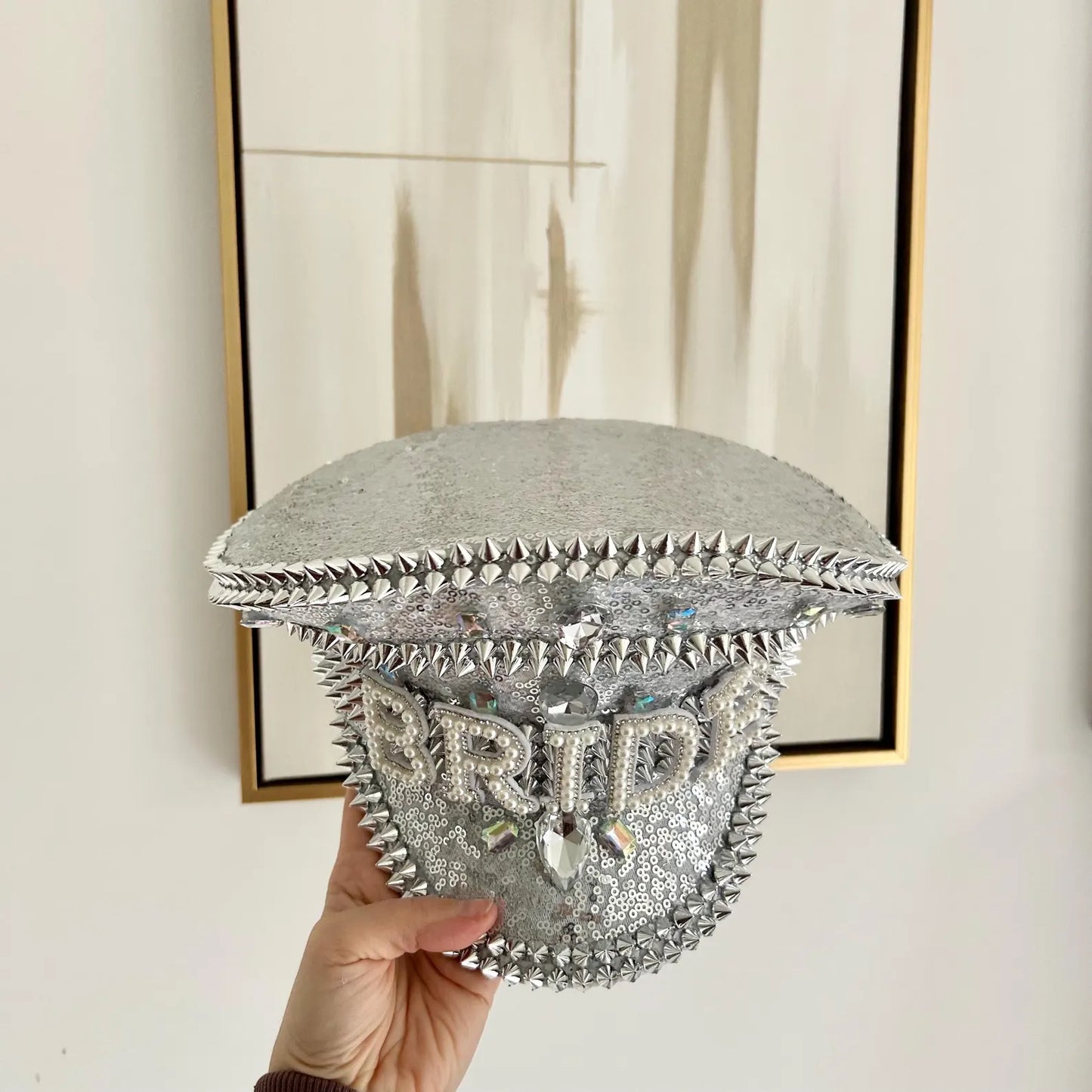 Back view silver sequin spike bride hat
